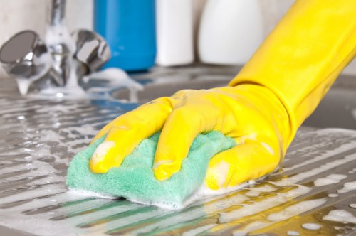 Local cleaners removing construction dust from windows and surfaces