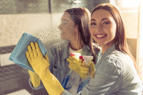 SW4 cleaners using protective equipment and careful handling methods